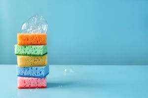 How To Winterize your RV(/how-to-winterize-your-rv/) – Colorful cleaning sponges with soap bubbles on blu 2022 11 08 11 03 24 utc